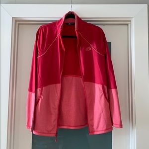 pink northface zip up jacket